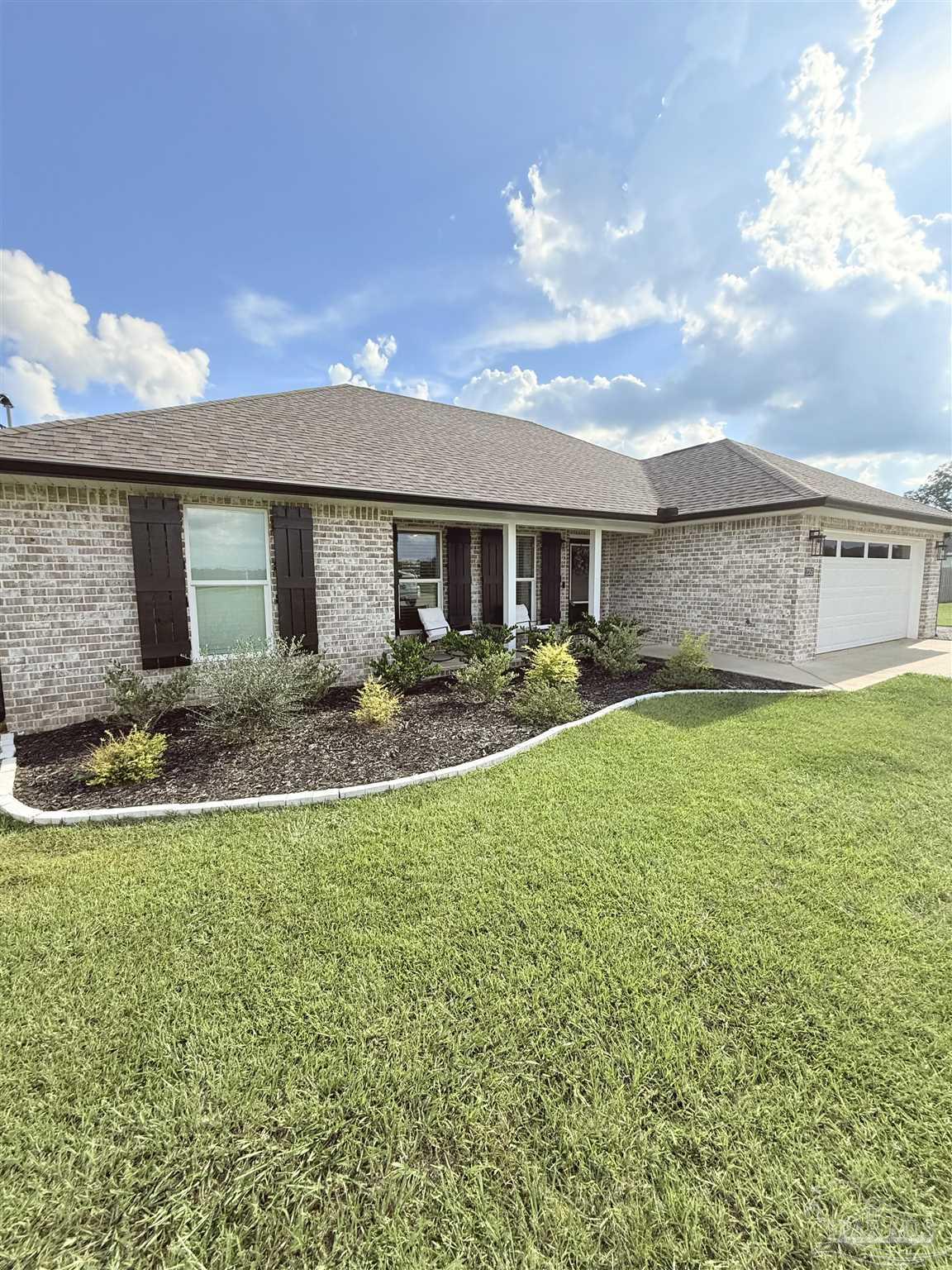 2351 Harvest Road Jay, FL 32565 - Photo 2 of 14 a swimming pool view with a outdoor seating