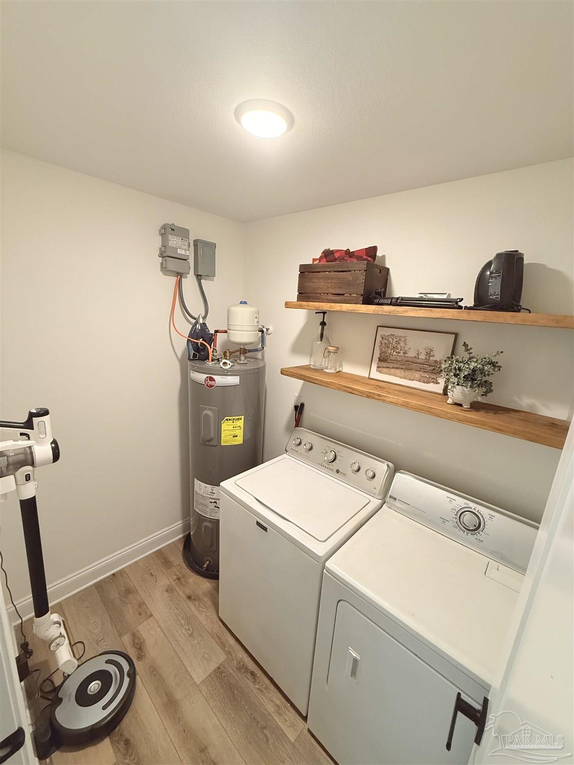 2351 Harvest Road Jay, FL 32565 - Photo 8 of 14 a room with storage and utility