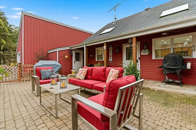 a backyard of a house with seating space