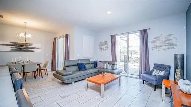 a bedroom with a large bed and a table