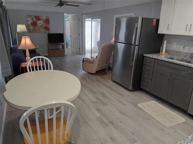a bathroom with a sink toilet and vanity