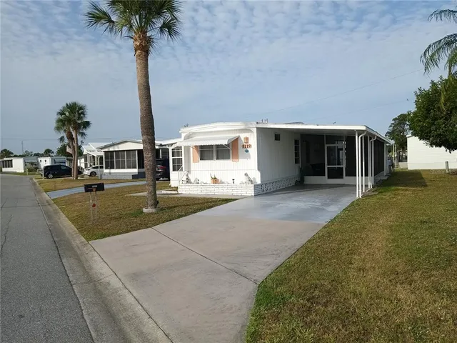 a front view of a house with street
