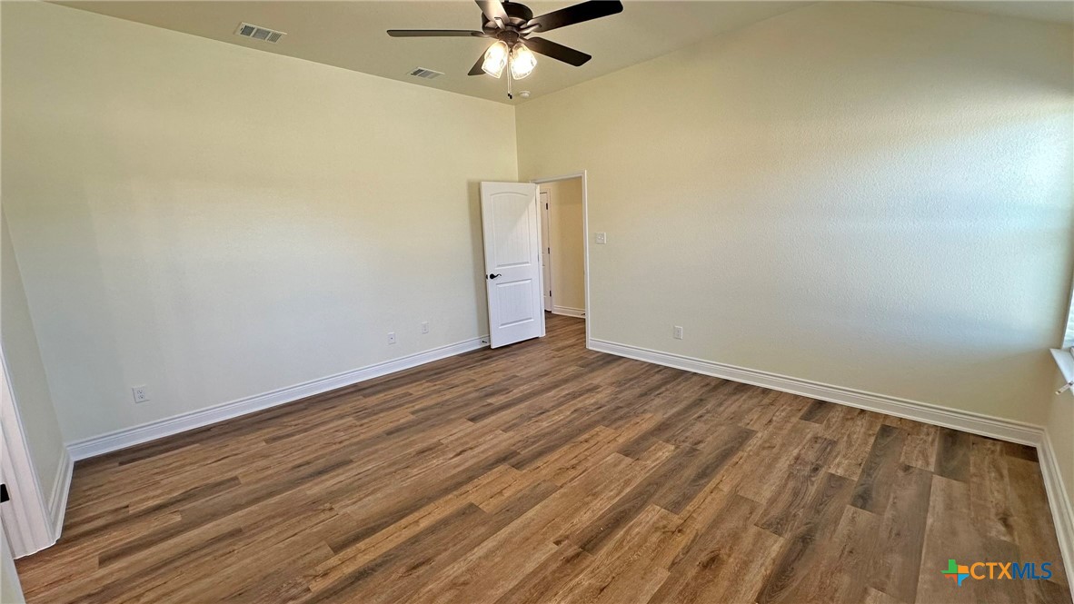 4237 Cool Basin Road Kempner, TX 76539 - Photo 32 of 36 wooden floor in an empty room