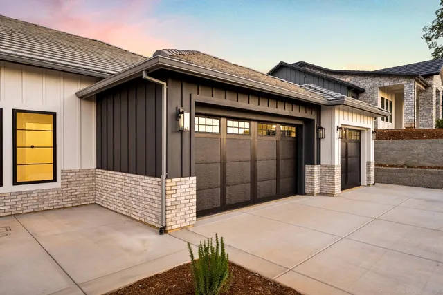a view of wooden house with a large window