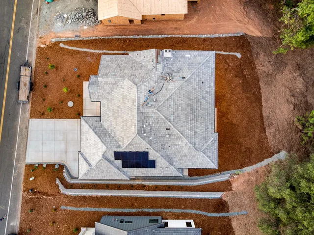 a house view with a garden space