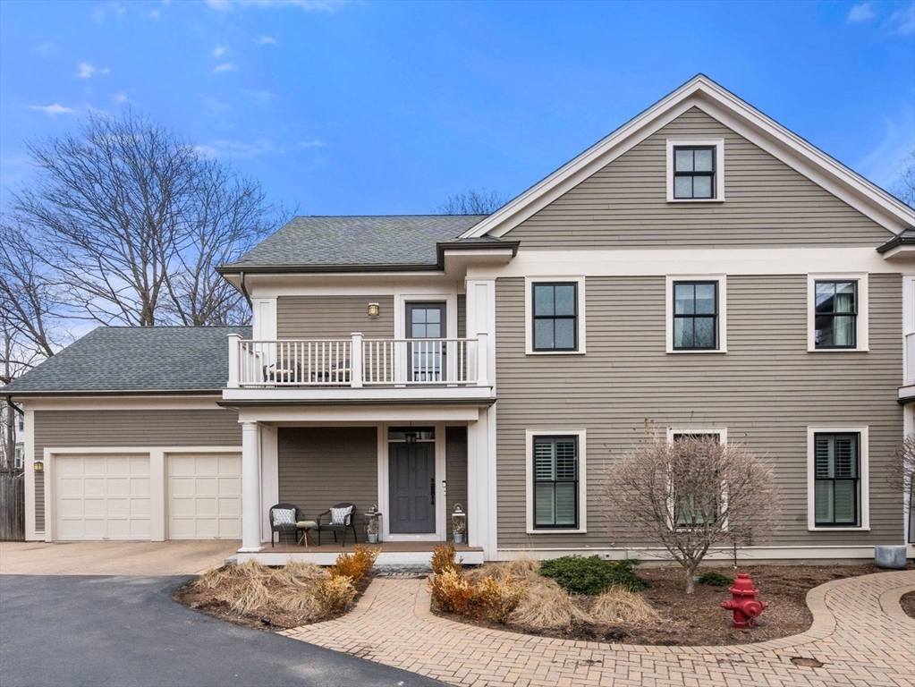 75 Auburn Street Newton, MA 02466 - Photo 1 of 34 a front view of a house with yard