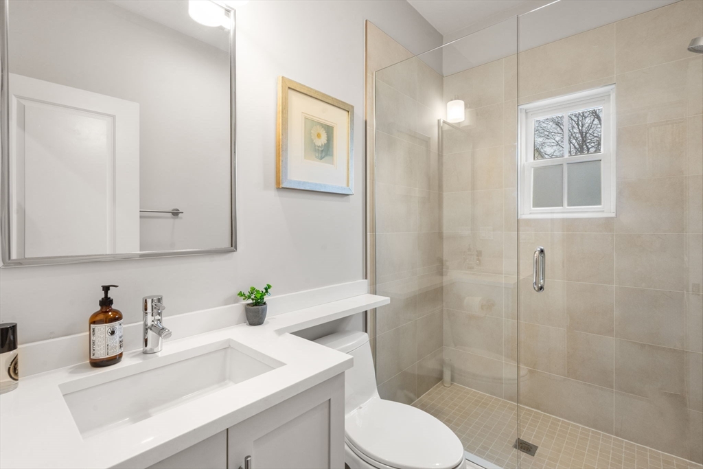 75 Auburn Street Newton, MA 02466 - Photo 26 of 34 a bathroom with a sink toilet and shower