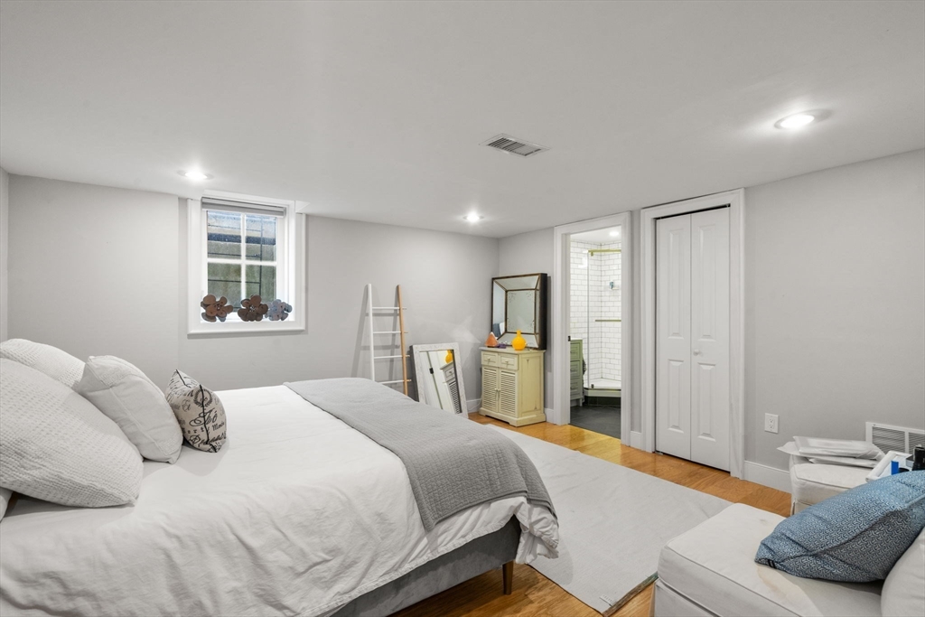 75 Auburn Street Newton, MA 02466 - Photo 27 of 34 a bedroom with a bed and a window