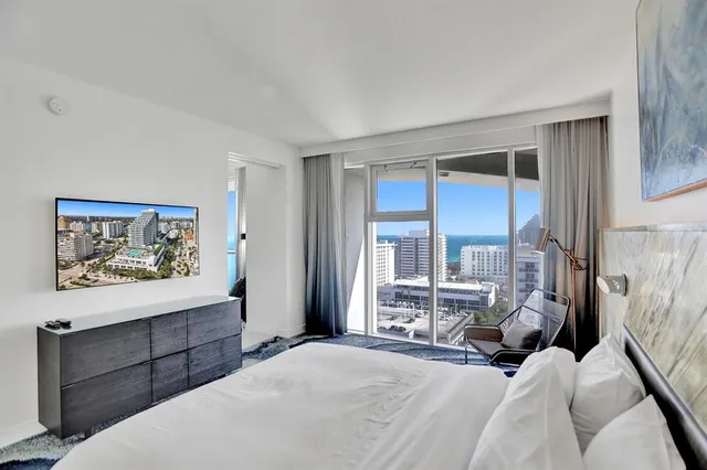 a view of a balcony with chair and table
