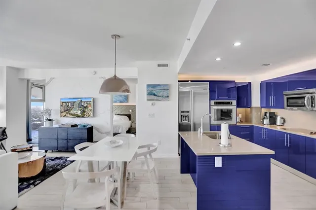 a view of city with ocean