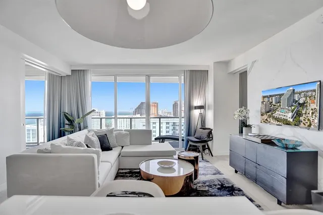 a view of city with ocean