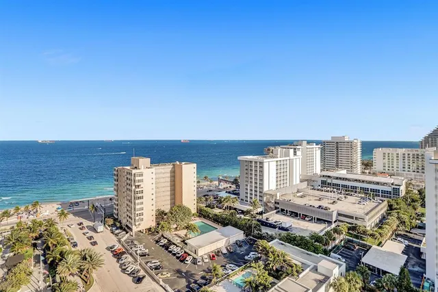 a view of city with ocean