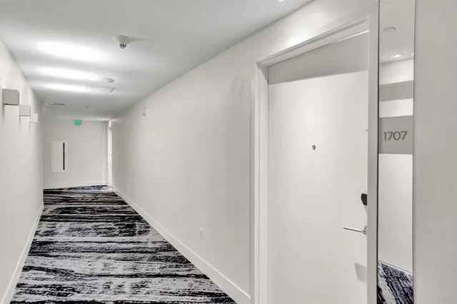 a view of city with tall buildings