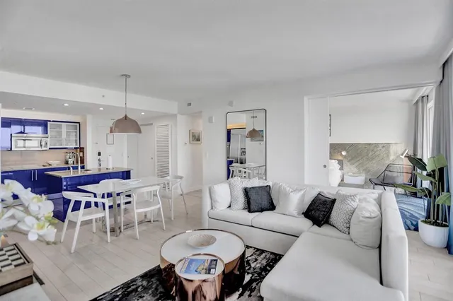 a living room with furniture and a table