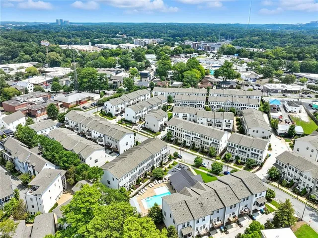 an aerial view of a city with lots of residential buildings