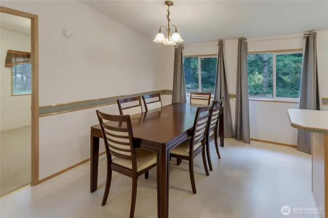 a kitchen with a refrigerator a sink and a refrigerator