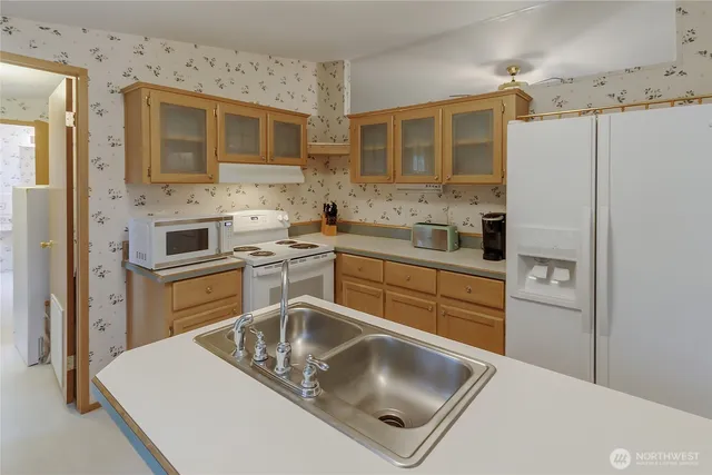 a bedroom with a bed and furniture