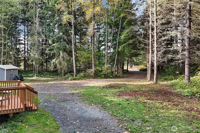 an aerial view of houses with yard