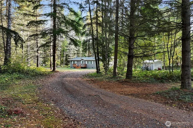 a house with trees in front of it