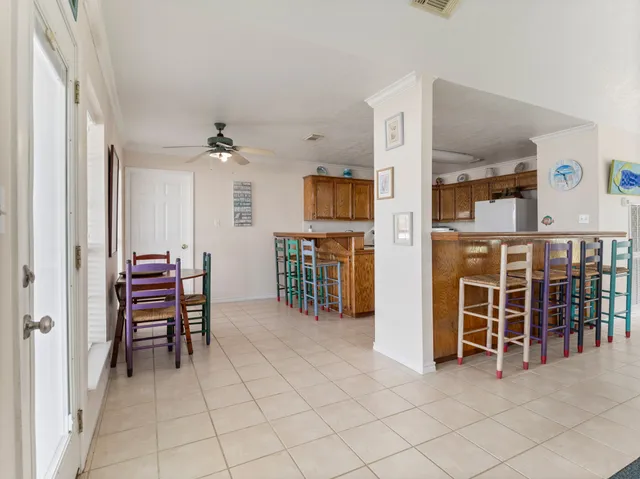 a view of a livingroom with furniture and an furniture