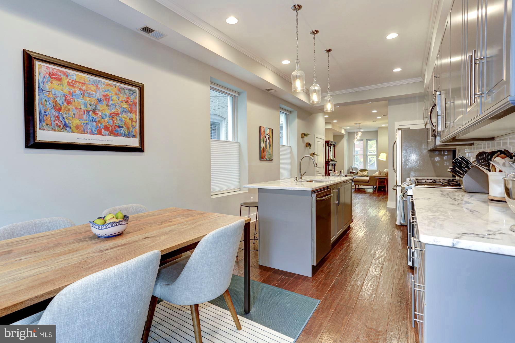 16 R Street Northwest, Unit 1 Washington, DC 20001 - Photo 8 of 22 Made for socializing, or, more intimate dining