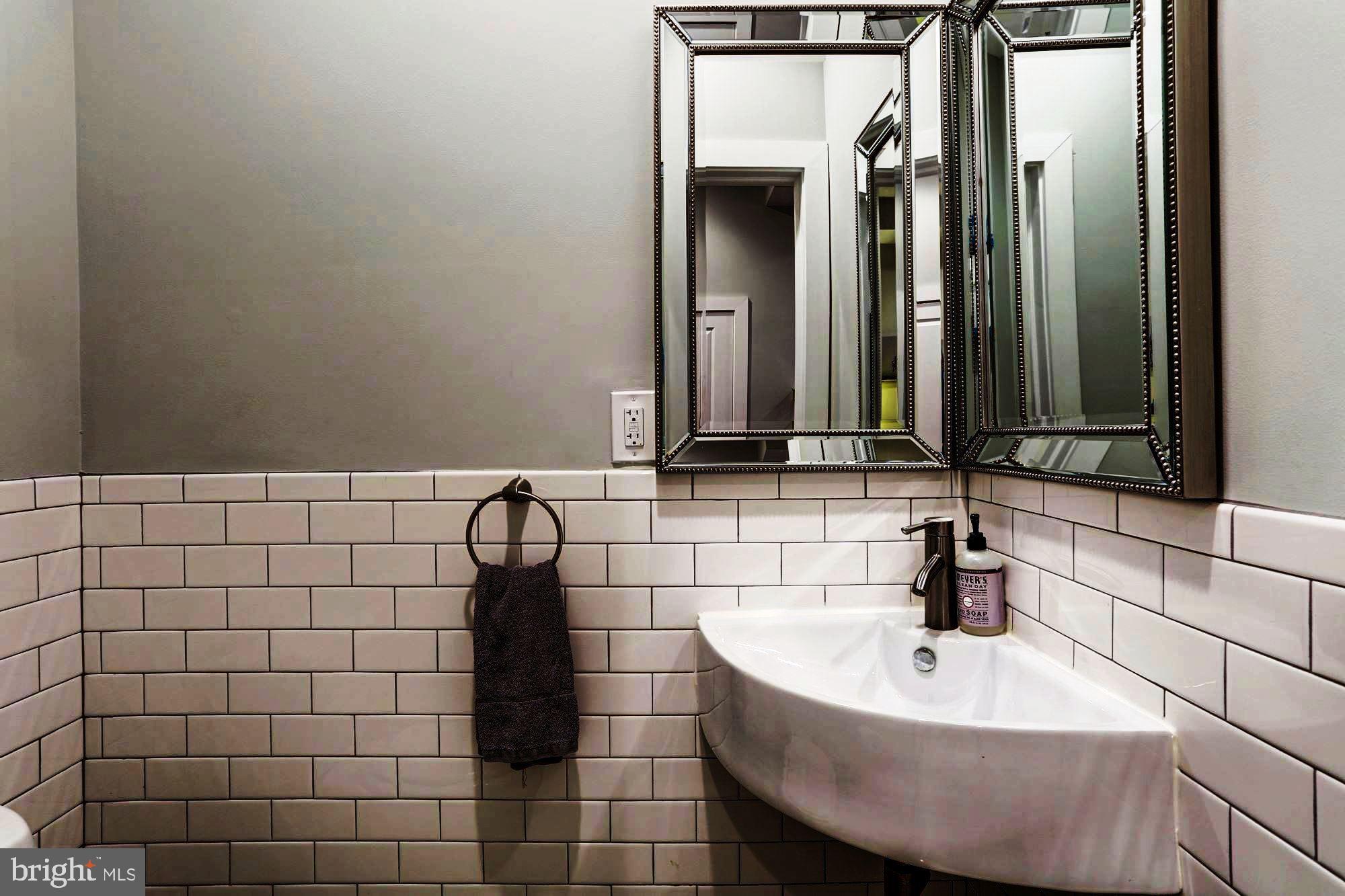 16 R Street Northwest, Unit 1 Washington, DC 20001 - Photo 9 of 22 Half Bath on main level