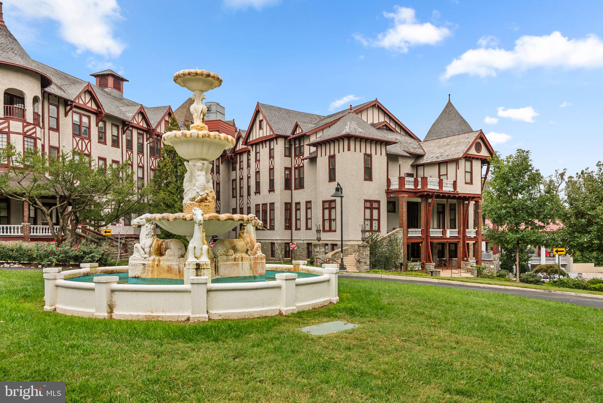 9610 Dewitt Drive, Unit B106 Silver Spring, MD 20910 - Photo 26 of 33 a view of a house with a yard porch and sitting area