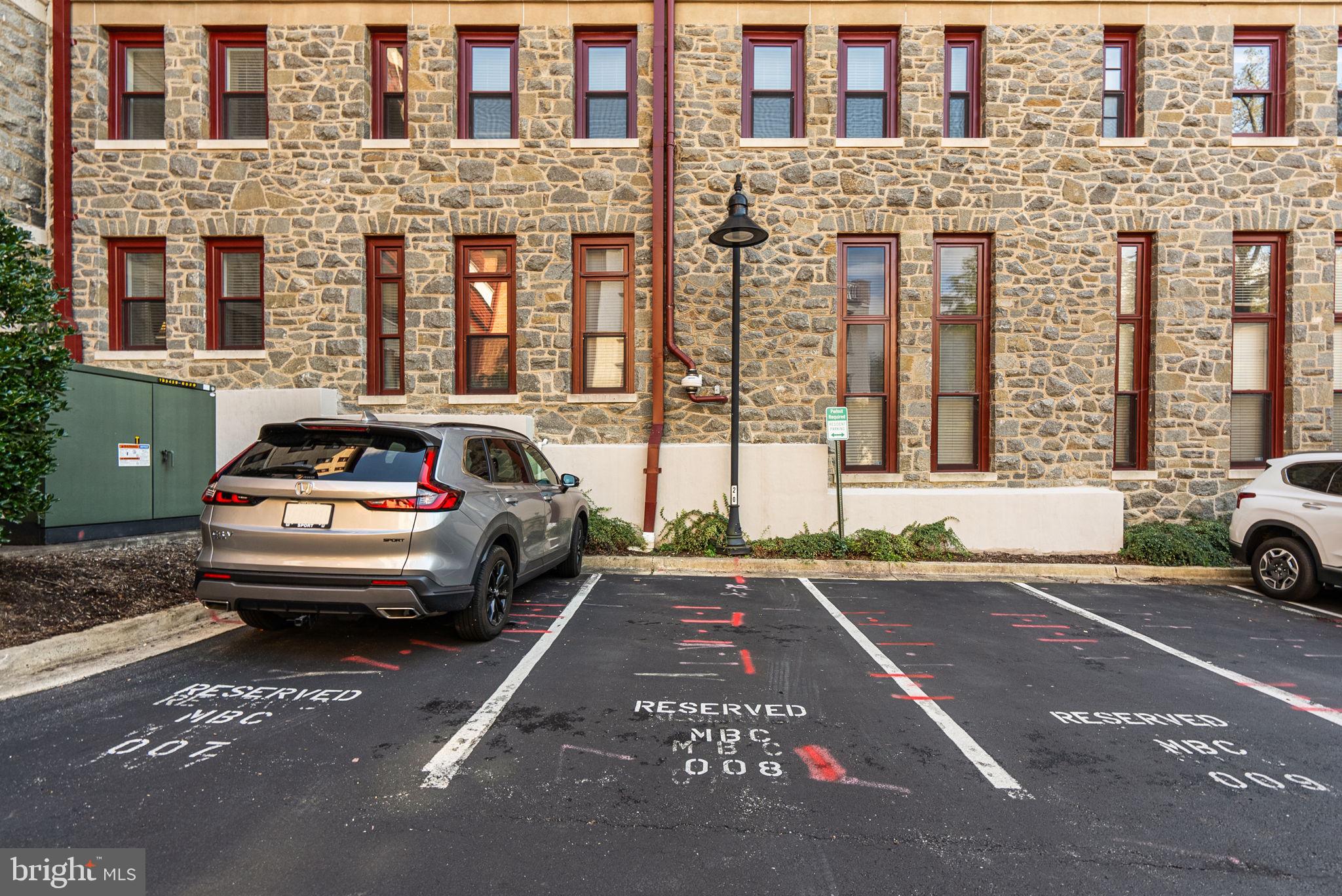 9610 Dewitt Drive, Unit B106 Silver Spring, MD 20910 - Photo 27 of 33 a car parked in front of a building