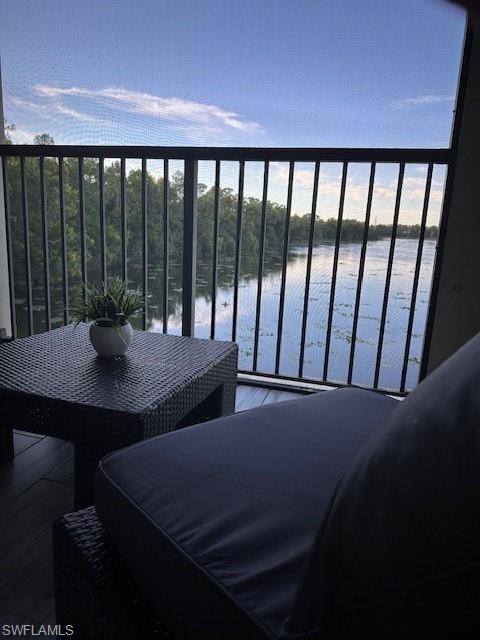 1205 Reserve Way, Unit 308 Naples, FL 34105 - Photo 15 of 21 a view of a balcony dining area
