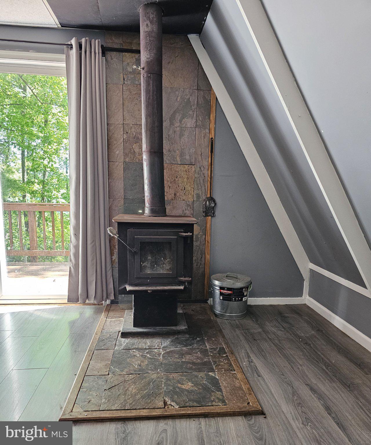 2628 High Top Road Linden, VA 22642 - Photo 10 of 11 Cozy corner with a rustic stove.