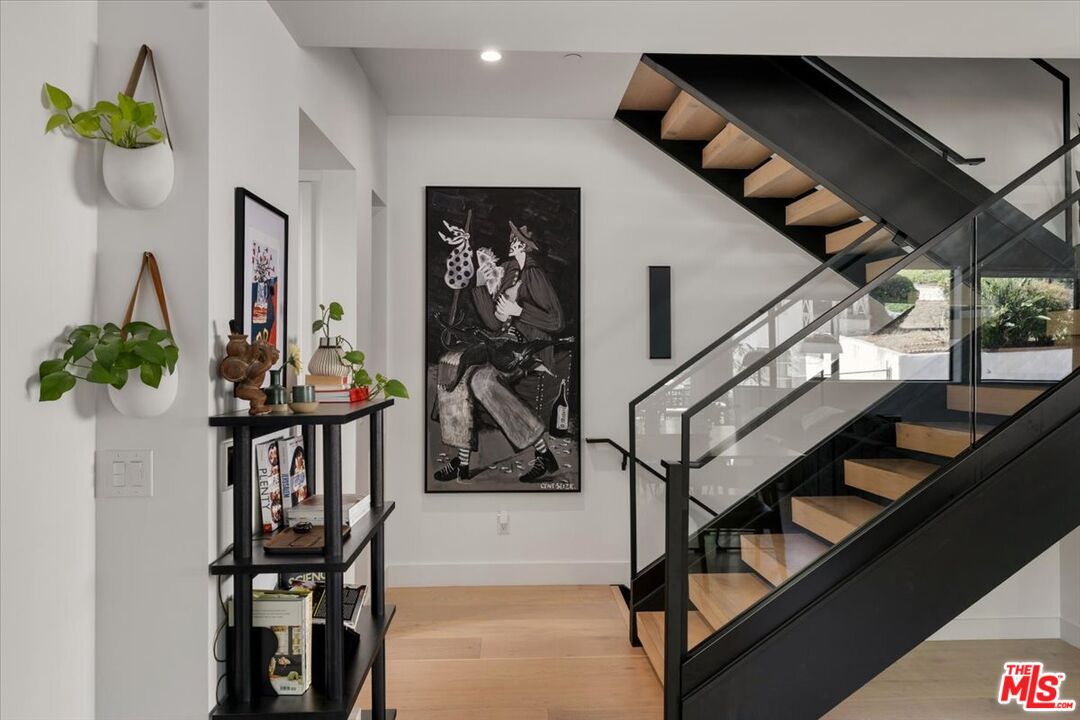 a view of entryway livingroom and hall