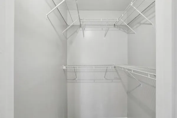 a view of a room with racks on the wall