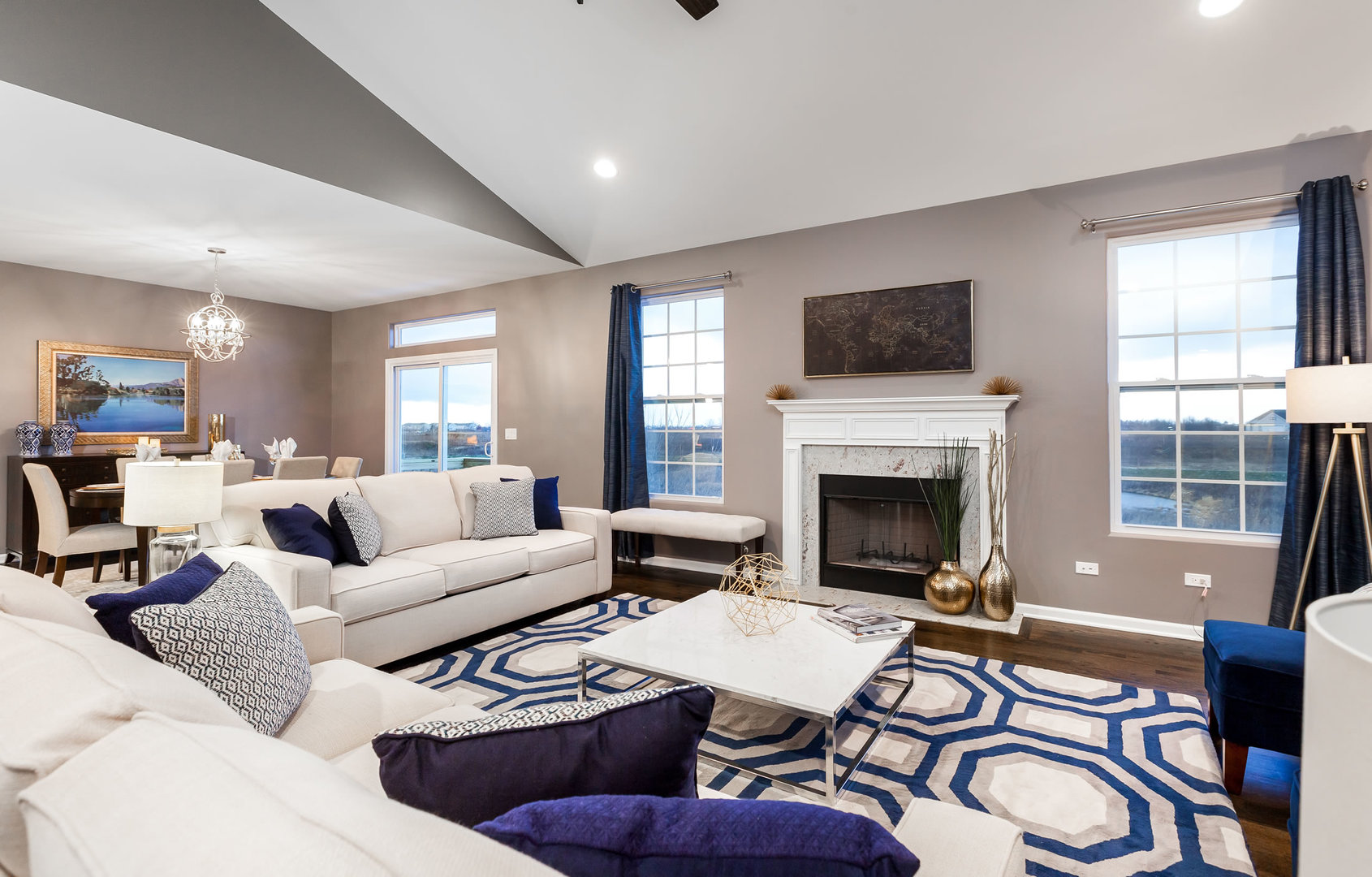 2831 Rood Street Yorkville, IL 60560 - Photo 13 of 17 a living room with furniture a flat screen tv and a fireplace