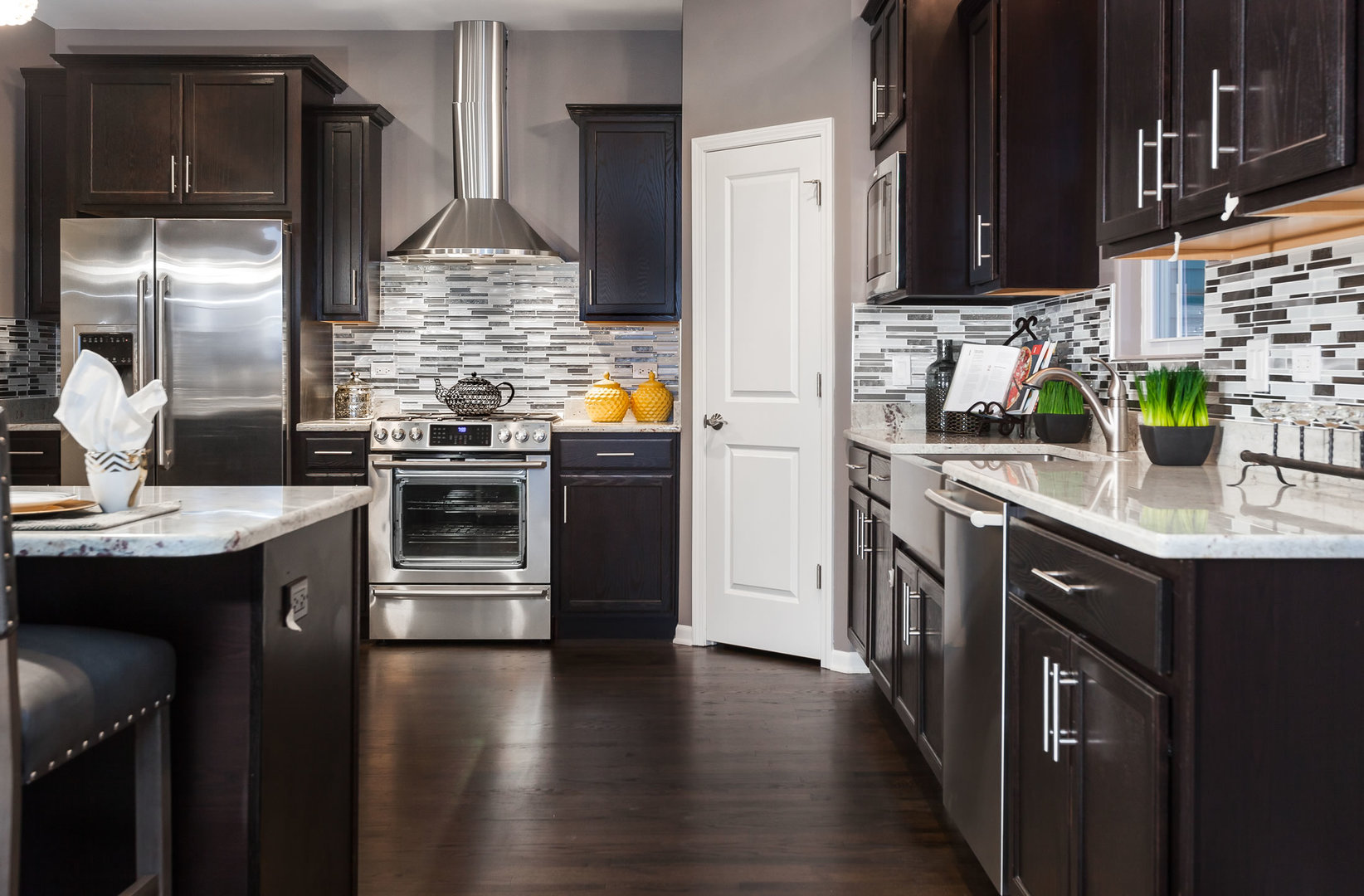 2831 Rood Street Yorkville, IL 60560 - Photo 4 of 17 a kitchen with stainless steel appliances granite countertop a sink stove and refrigerator