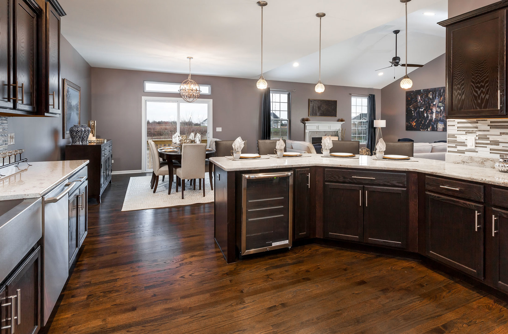 2831 Rood Street Yorkville, IL 60560 - Photo 7 of 17 a kitchen with lots of counter space a sink appliances and dining table