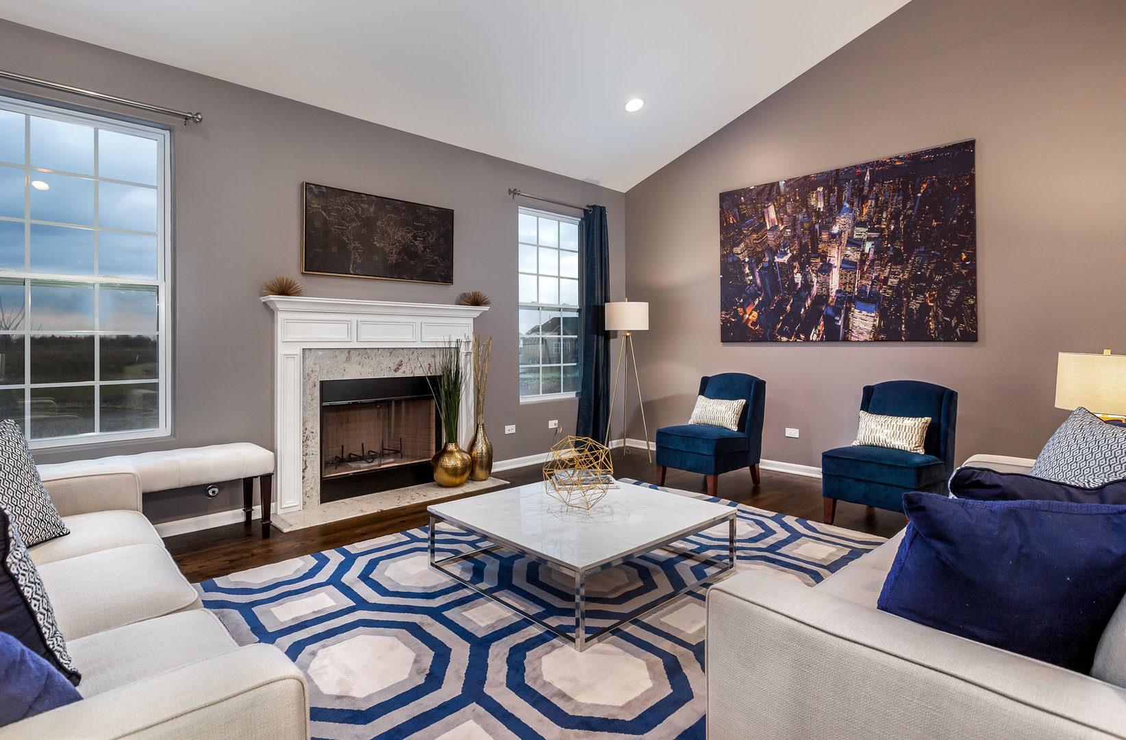 2831 Rood Street Yorkville, IL 60560 - Photo 10 of 17 a living room with furniture a fireplace and a flat screen tv