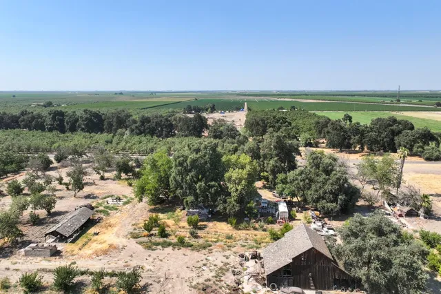 a view of a city with green space