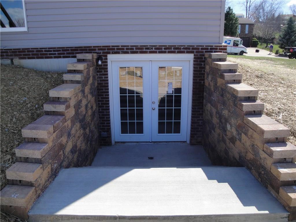 75 Windcrest Drive Cecil, PA 15321 - Photo 21 of 25 Double French patio door installed in basement for a walk out game room or lower level family room...