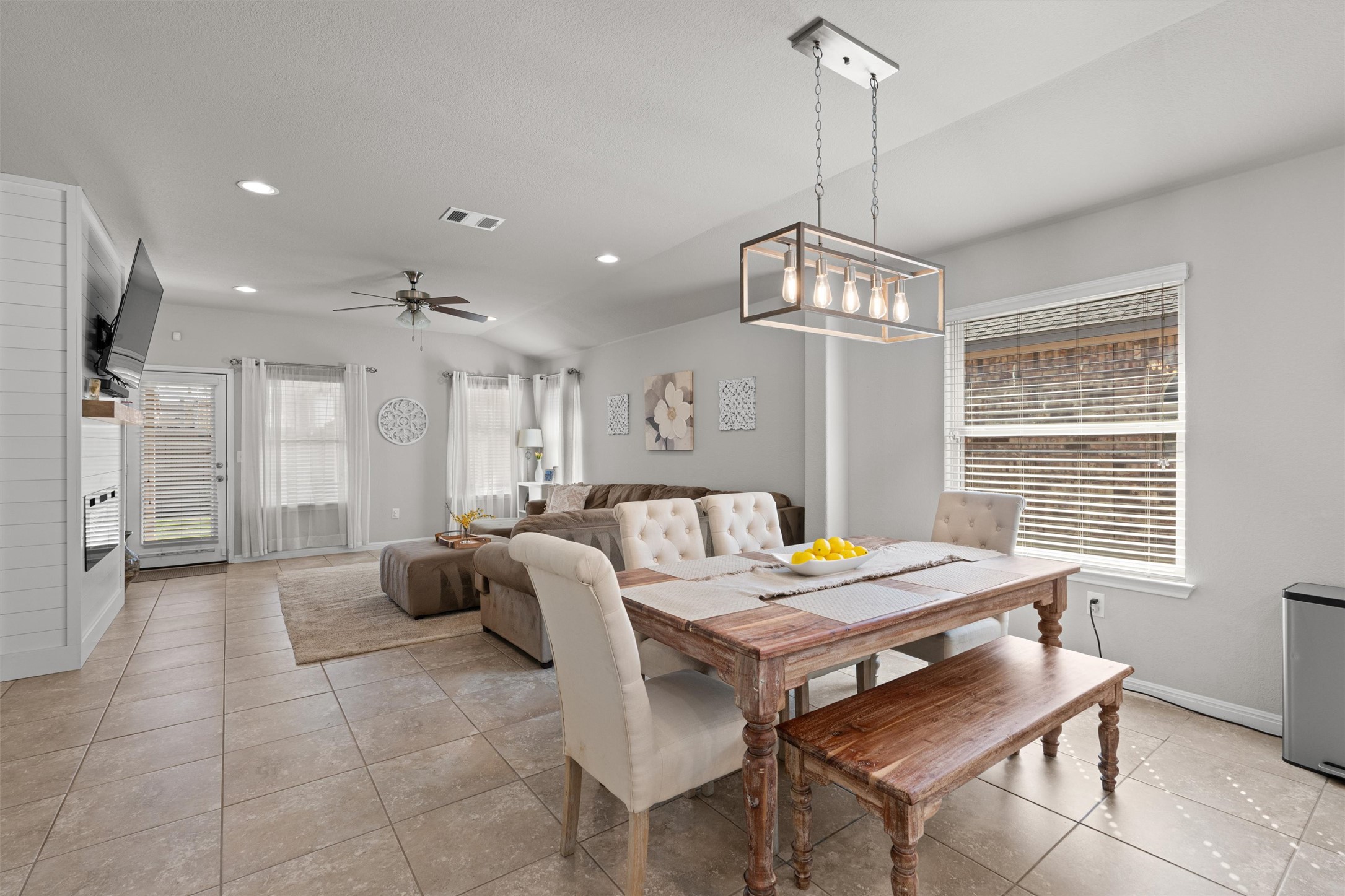 524 Longhorn Cavern Road Leander, TX 78641 - Photo 11 of 33 Dining area featuring healthy amount of natural light, vaulted ceiling