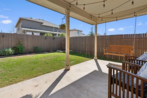 a view of a backyard with a tub
