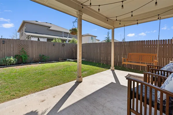 a view of a backyard with a tub