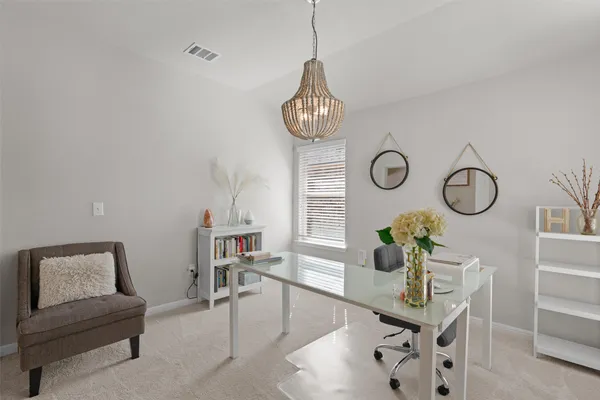 a view of a dining room with furniture