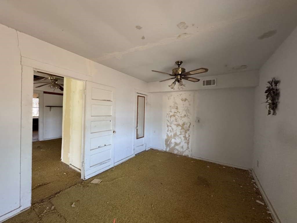 4608 Wasson Road Big Spring, TX 79720 - Photo 5 of 13 wooden floor in an empty room