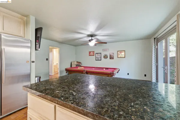 a bathroom with a shower and a sink