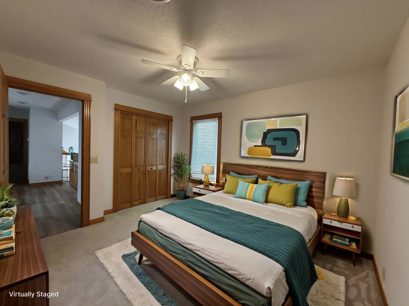 136 Bonnie Brae Road Carbondale, IL 62901 - Photo 17 of 30 a bedroom with a bed and a chandelier