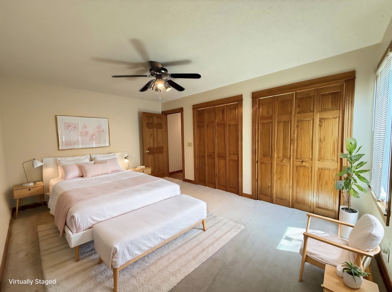 136 Bonnie Brae Road Carbondale, IL 62901 - Photo 19 of 30 a spacious bedroom with a bed and a chandelier