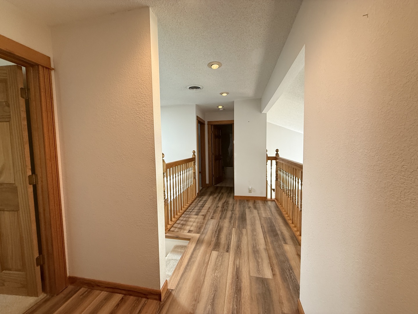 136 Bonnie Brae Road Carbondale, IL 62901 - Photo 21 of 30 a view of a hallway with wooden floor and staircase