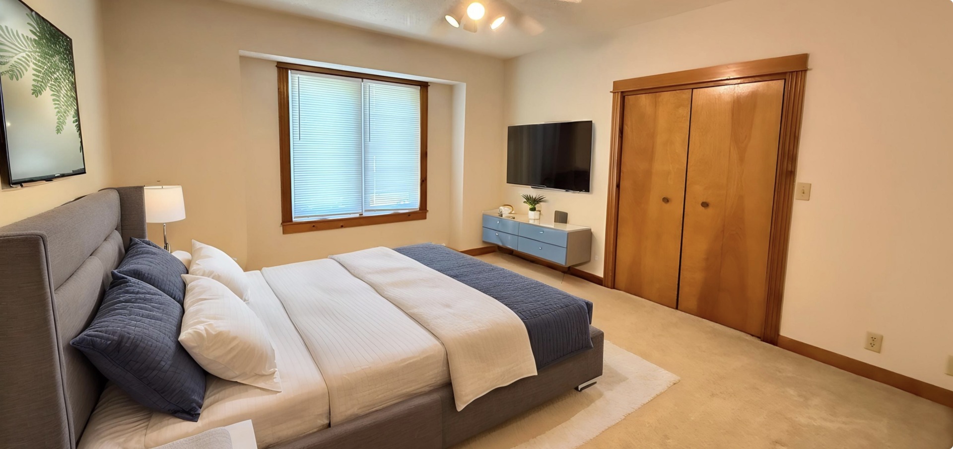 136 Bonnie Brae Road Carbondale, IL 62901 - Photo 24 of 30 a bedroom with a bed and a flat screen tv