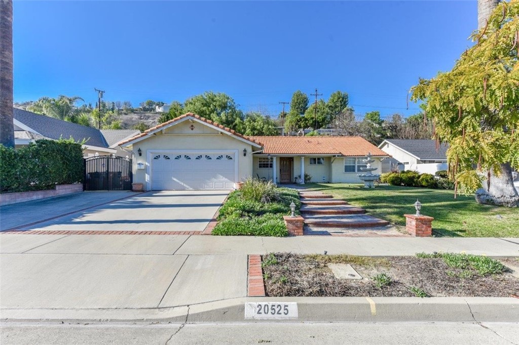 20525 Varsity Drive Walnut, CA 91789 - Photo 1 of 3 front view of house with a yard