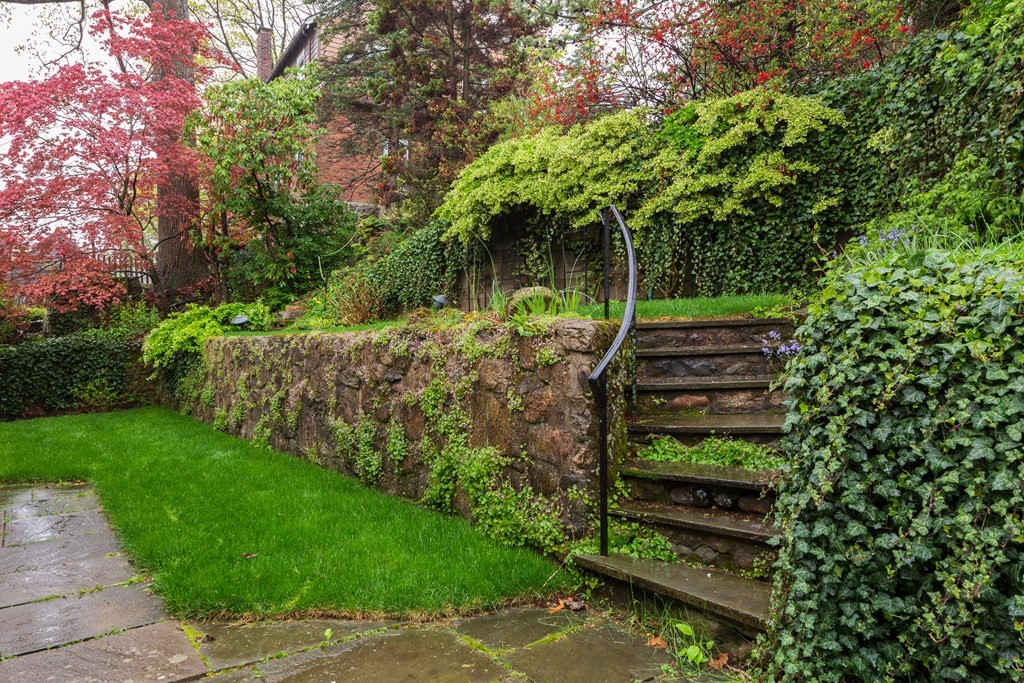 39 Cedarwood Road Boston, MA 02130 - Photo 11 of 11 a view of a backyard with chairs